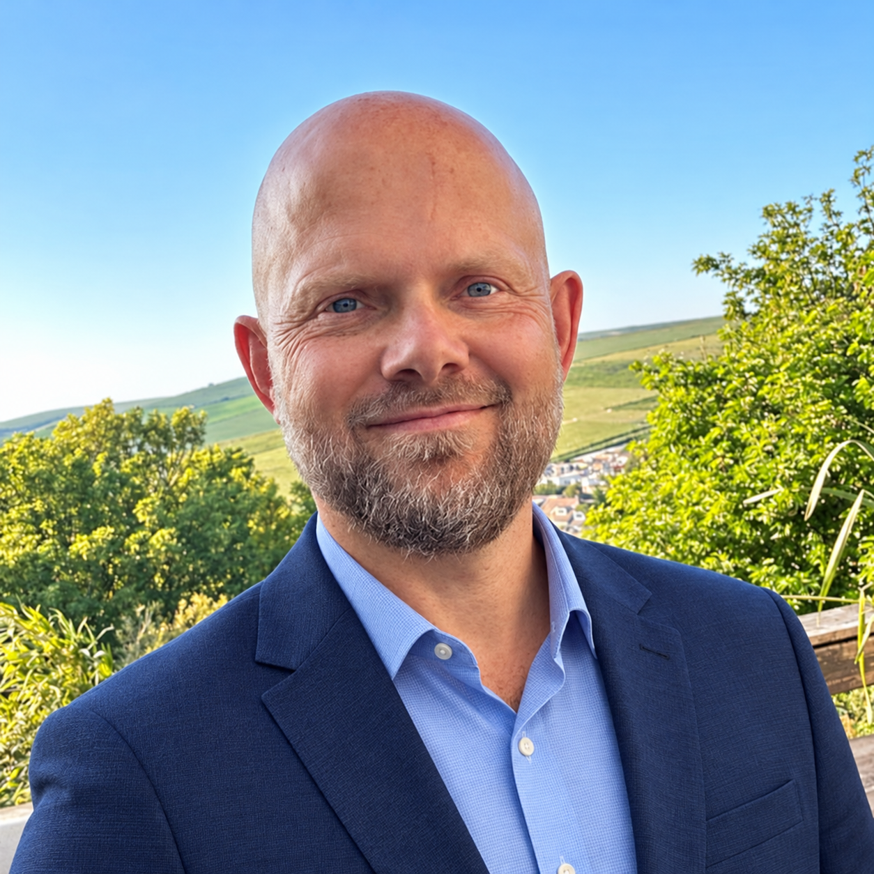 Adam Betteridge of Sussex Wills & Attorneys standing outdoors with the Sussex South Downs behind